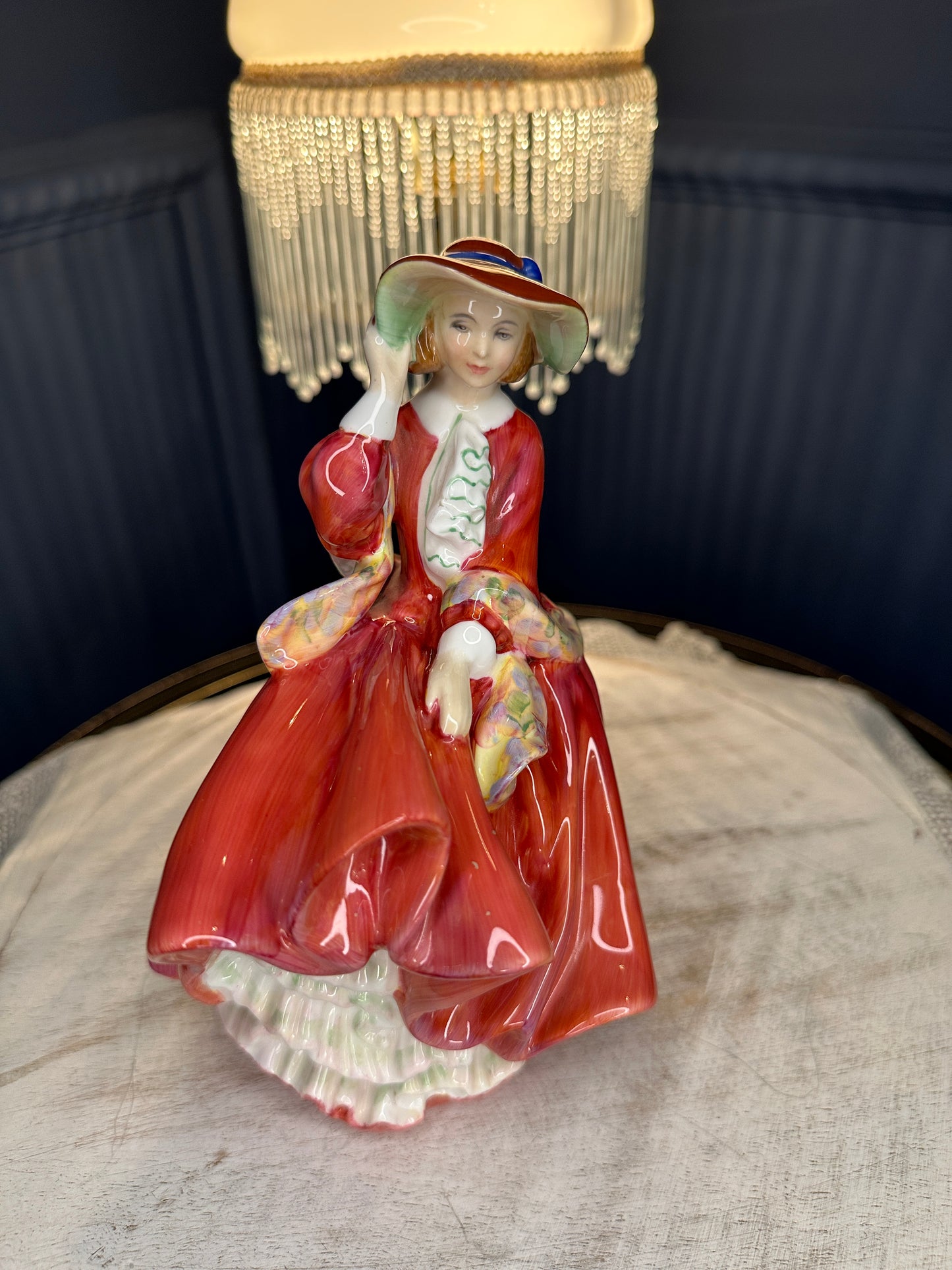 Royal Doulton Figurine “Top o’ the Hill” HN 1834 – Vintage English Porcelain Lady (1937)